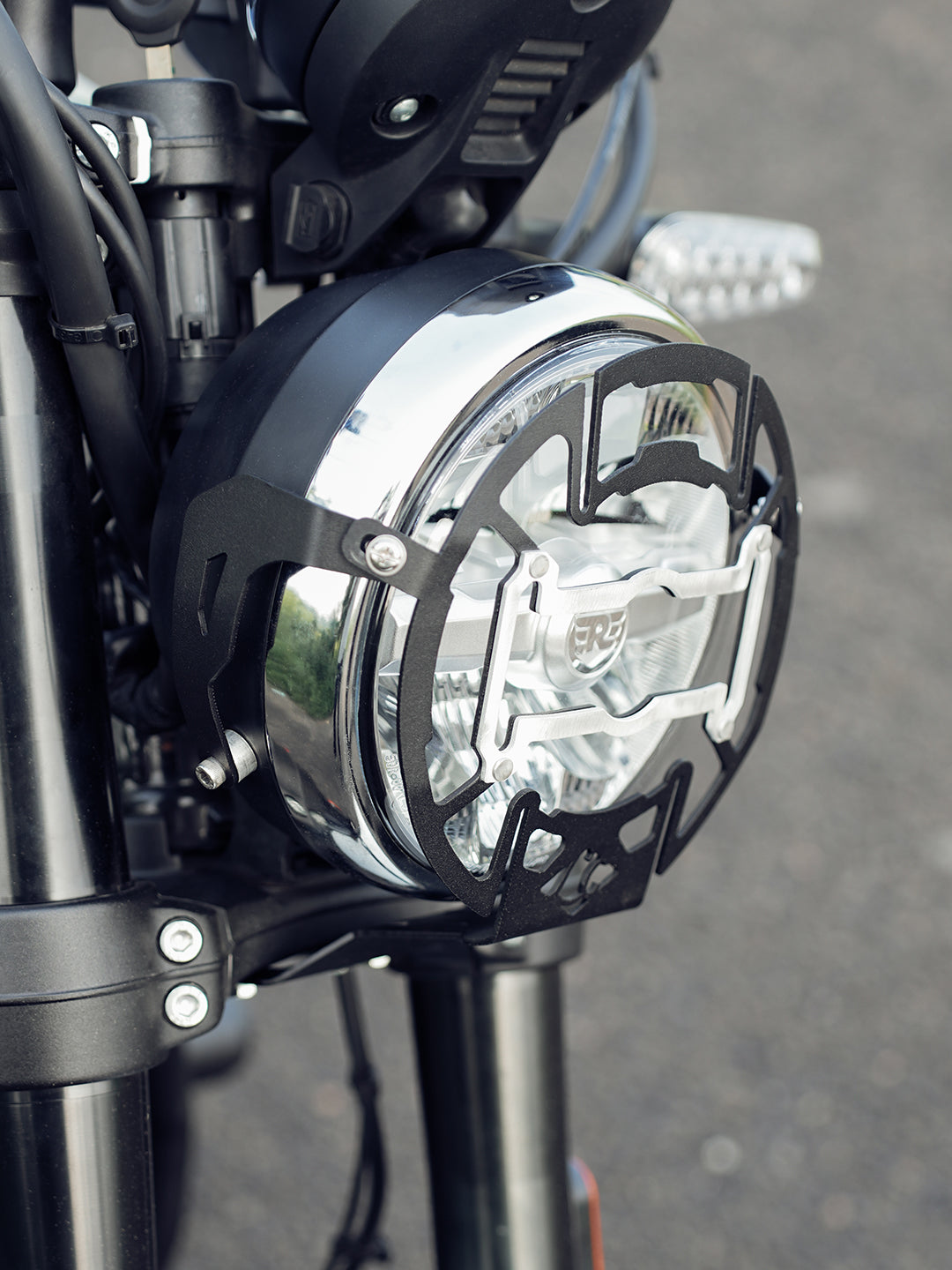 RE Bear 650 Mig Headlight Grill With Number Plate